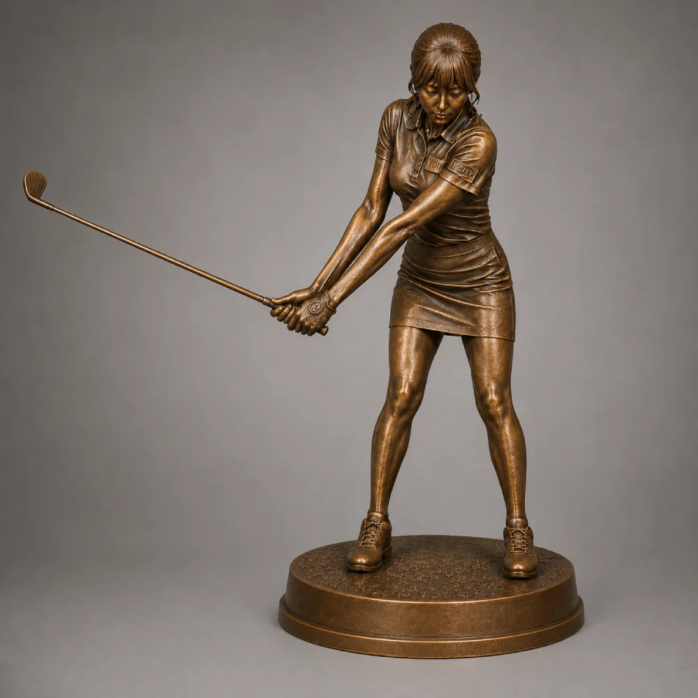 A professionally cast life-size female golfer bronze statue in a mid-swing pose. This custom-made, high-quality outdoor sculpture by Yun Sculpture is designed as a permanent landmark for country club entrances and fairways, communicating institutional prestige and durability.