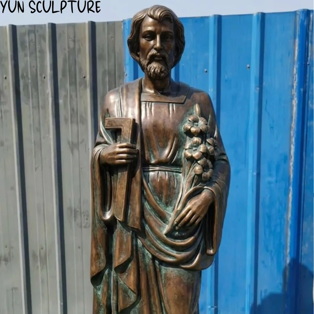 A life-size bronze statue of Saint Joseph the Worker with a natural patina, completed and ready for shipping to meet a May 1st dedication ceremony.