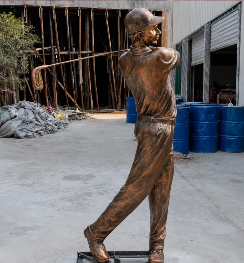 A finished life-size bronze golf statue with a high-temperature chemical patina, designed for permanent outdoor installation. Built with a 5-8mm wall thickness, this structural metal sculpture is engineered to withstand decades of weathering while developing a beautiful natural patina.