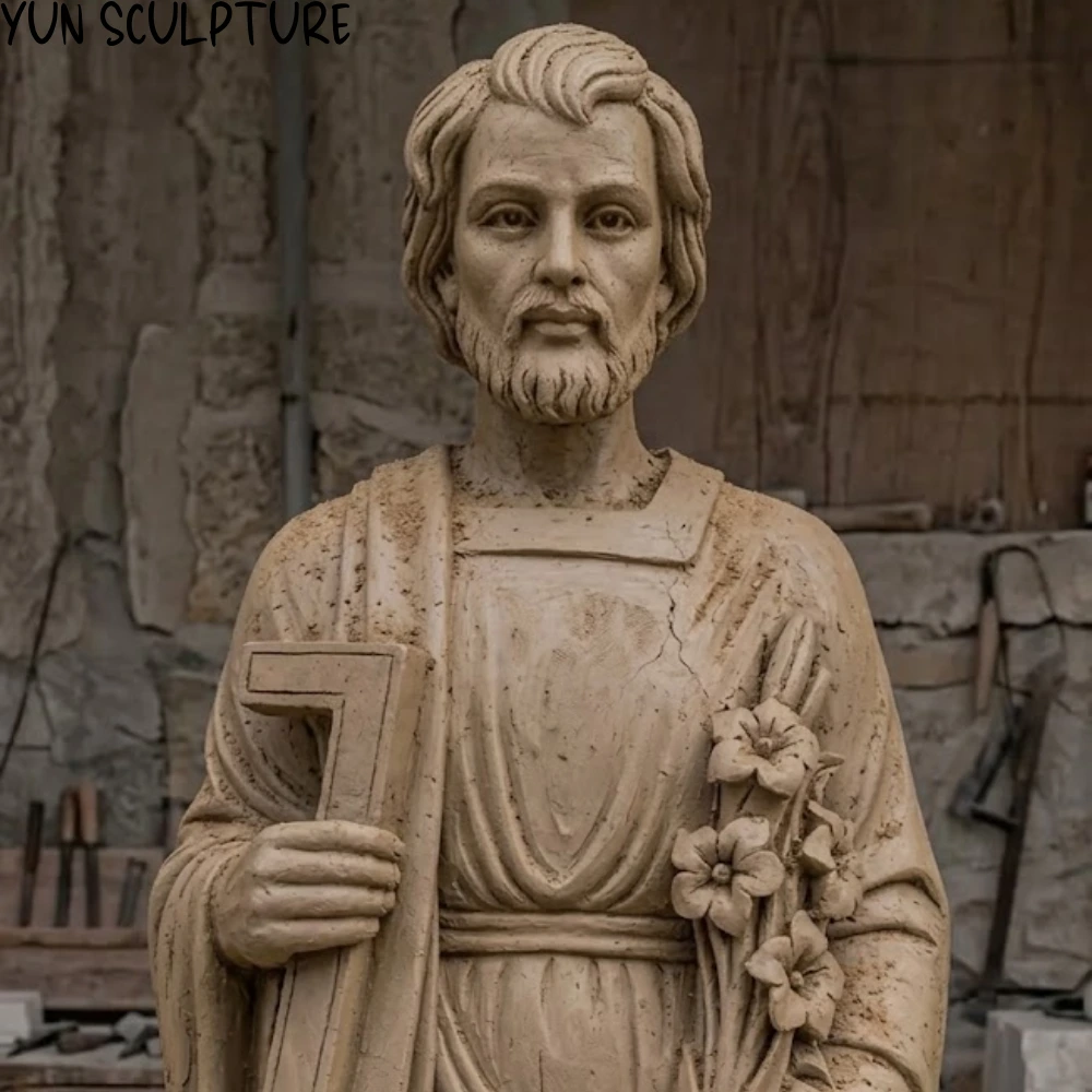 A detailed clay maquette of a St. Joseph statue used for institutional approval, showing the final locked-in facial expression and carpenter's square before marble carving.