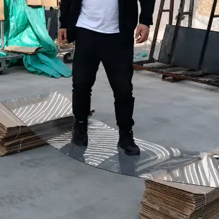 A strength demonstration of single-layer tempered safety glass, showing its high impact resistance and flexibility, designed to withstand heavy hail and pressure.