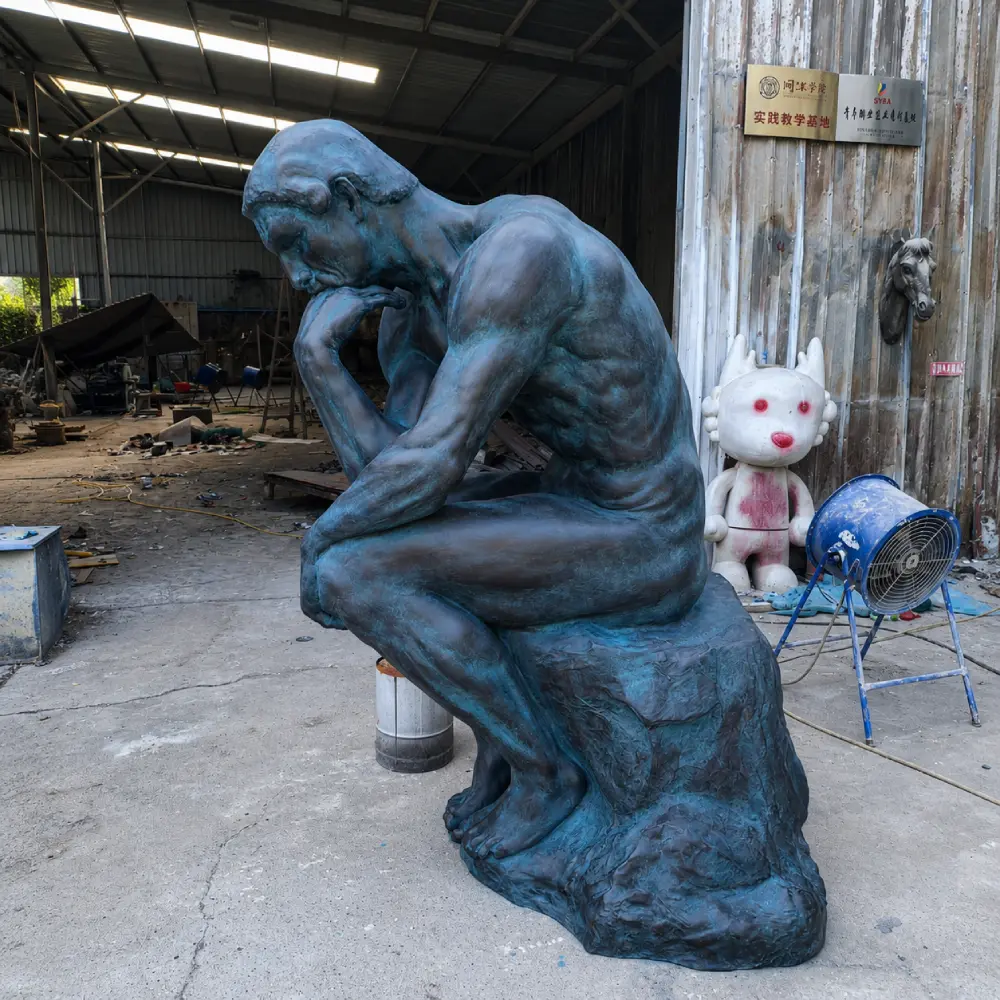Side profile of a heavy-duty cast bronze Thinker statue weighing approximately 150kg. Built with a wall thickness of 5 to 8mm, this permanent outdoor monument is designed for absolute structural integrity and longevity.