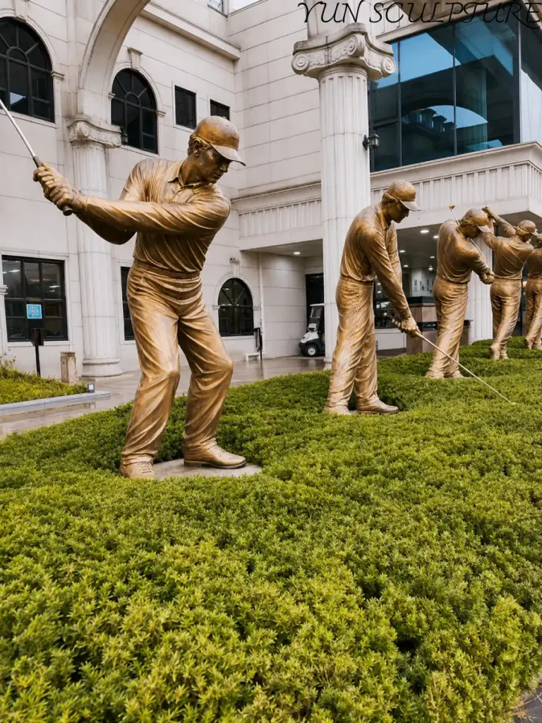 Heroic-scale bronze golfer sculptures capturing the early stages of a golf swing, designed to anchor the visual sightlines of a professional fairway or entrance.