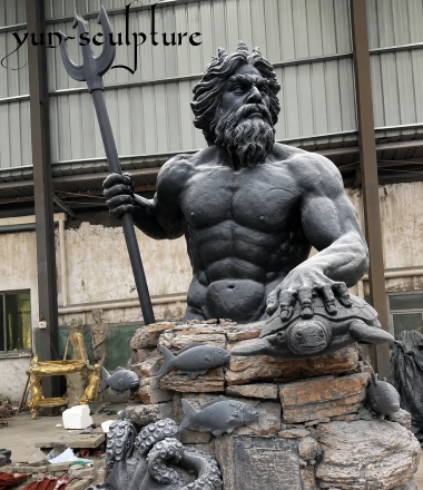 A promotional card on a teal background featuring a photo of a dark grey sculpture of the sea god Poseidon (or Neptune). The muscular, bearded deity holds a trident in his right hand and rests his left hand on a sea turtle, emerging from a rocky base adorned with carved fish and octopus tentacles. A black "yun-sculpture" watermark is located in the upper left corner. Below the photo, the text reads: "Poseidon & Neptune - The Kings of the Sea. Perfect for swimming pools and fountains."