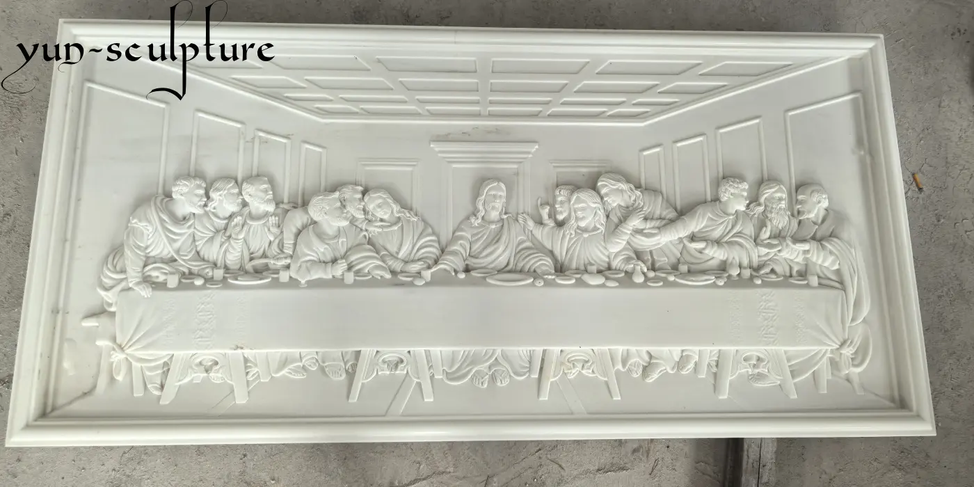 A high-detail hand-carved white marble relief of The Last Supper, designed as a decorative panel for a Catholic church altar. As part of our expert church interior design services, we ensure this stone element matches the material and style of your altar, ambo, and sanctuary walls for a unified aesthetic.