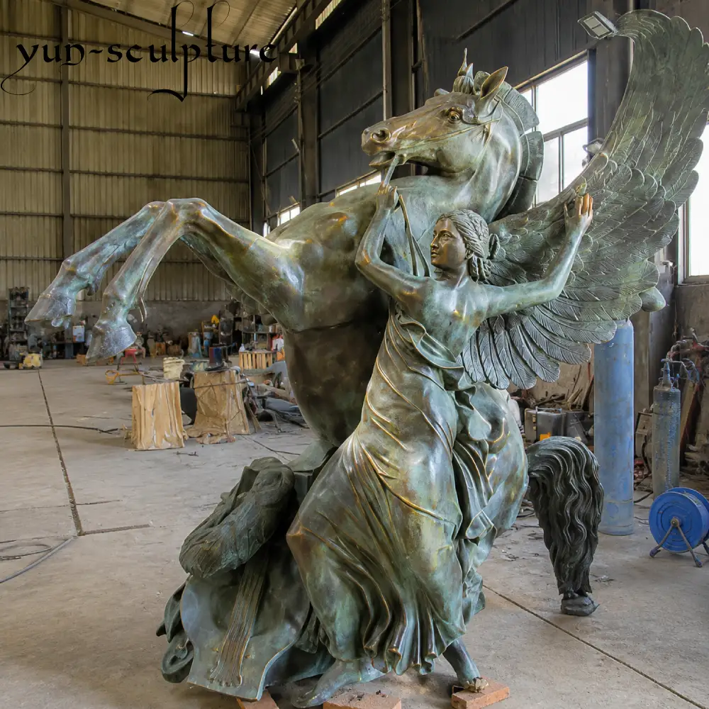 A monumental life-size cast bronze sculpture of a winged woman and a rearing horse at the Yun Sculpture foundry. Following our professional production standards, this piece features a 7mm wall thickness and a permanent, heat-applied chemical patina, ensuring decades of structural integrity and color stability in outdoor environments.
