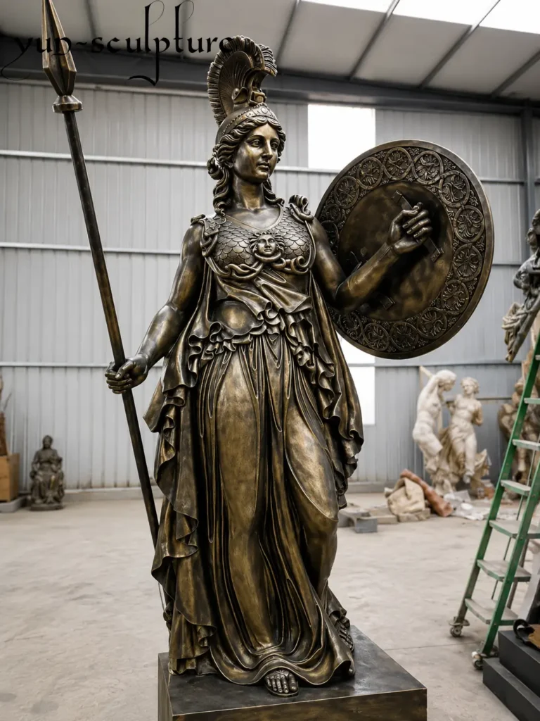 A majestic life-size bronze statue of Athena (Minerva) in the Neoclassical style, featuring a detailed crested helmet, spear, and Medusa-head shield. Following the 18th-century tradition of returning to Greek and Roman models, this sophisticated figurative sculpture by Yun Sculpture is designed as a versatile statement piece for high-end residential or institutional interiors.