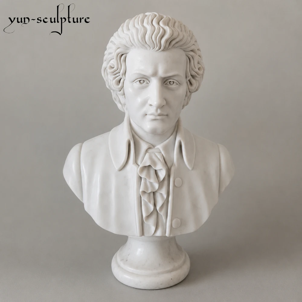 A hand-carved natural white marble bust of Wolfgang Amadeus Mozart, featuring intricate detail in the 18th-century attire and powdered wig style. This composer sculpture is the ideal choice for music rooms, recording studios, or private studies, embodying the spirit of musical genius and creative achievement as described in our guide.