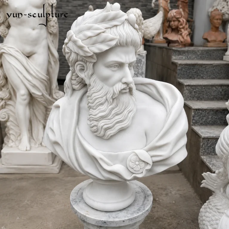 A hand-carved natural white marble bust of Zeus wearing a laurel wreath, symbolizing "kosmos" or cosmic ordered authority. Mounted on a marble pedestal, this classical presiding figure is designed to anchor leadership spaces such as boardrooms, executive offices, and law chambers, reflecting a 2,500-year tradition of divine architectural power.