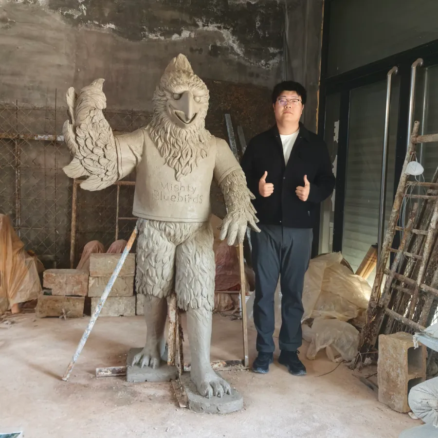 Clay model of the bluebird mascot sculpture shown for proportion and design confirmation.