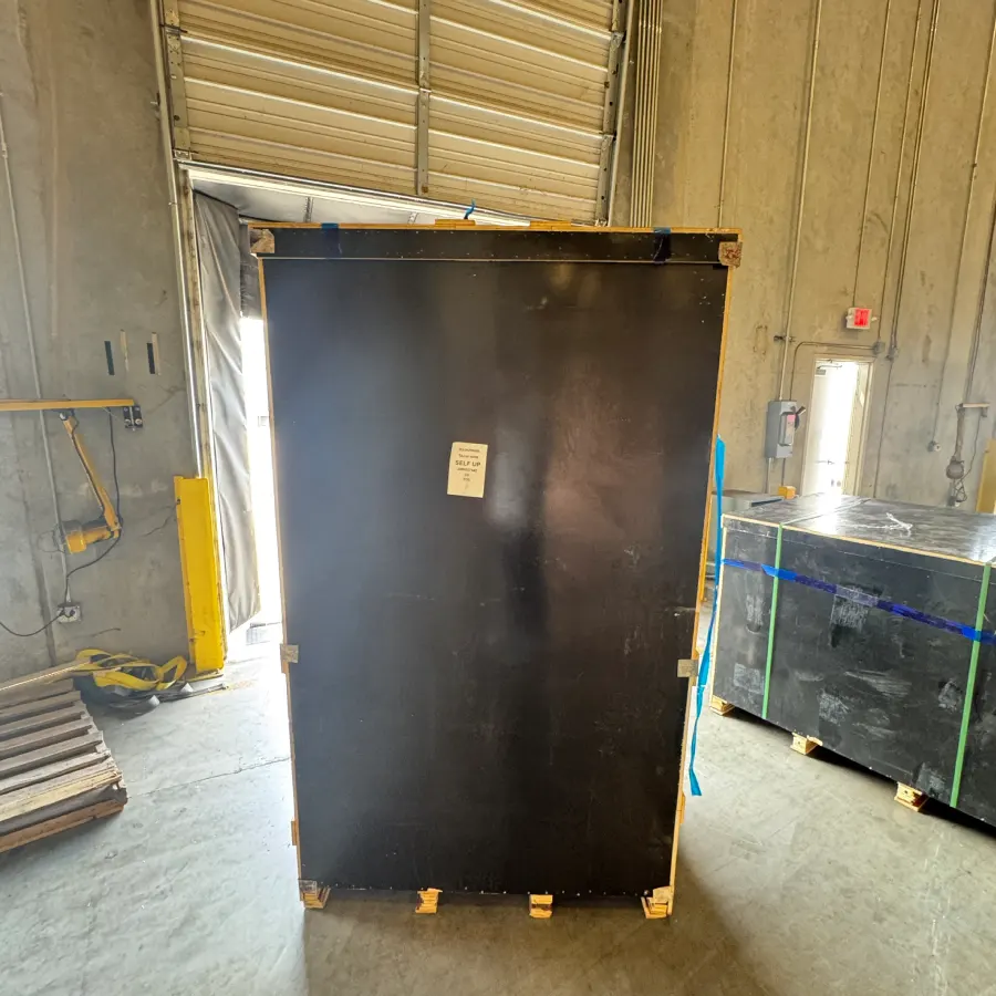 Export crates for the custom bronze bluebird sculptures arrived safely with no visible shipping damage before final delivery.