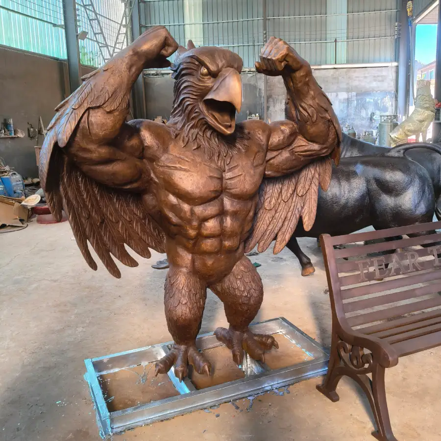 Finished muscular bronze bluebird sculpture during the final surface and appearance check before shipment.
