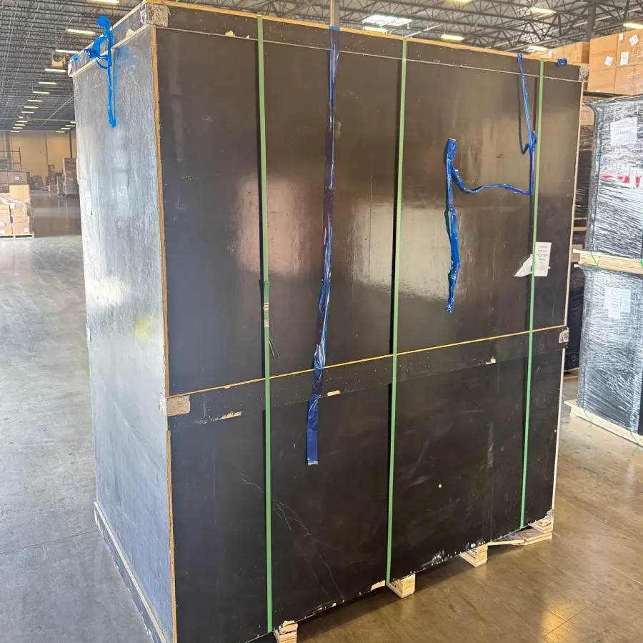 Reinforced shipping crate for the custom bronze bluebird sculpture arrived intact at the U.S. warehouse.