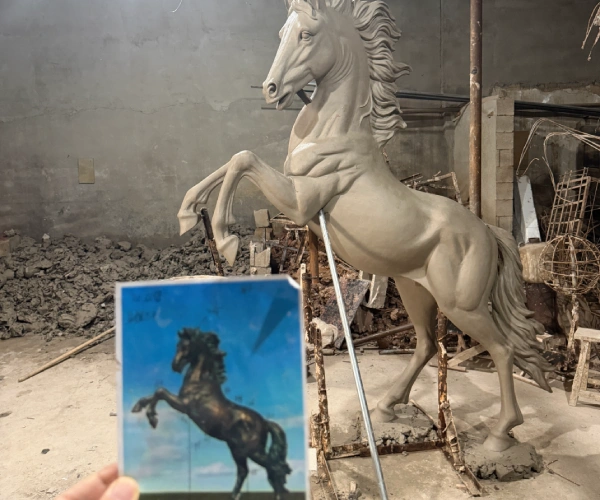 Clay model of the rearing horse sculpture being developed from the approved concept design.