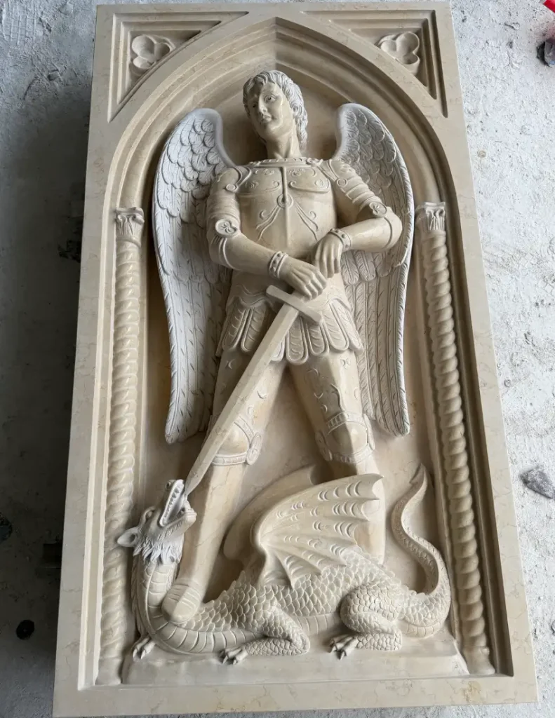 Finished St. Michael marble relief with sword, wings and dragon for a U.S. church project