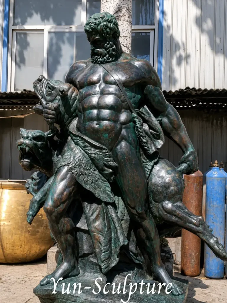 A heroic-scale cast bronze statue of Hercules capturing Cerberus, exemplifying the Hellenistic period's emotional intensity and dynamic movement. This intricate multi-figure group, hand-cast at the Yun Sculpture foundry, offers the greatest spatial presence for outdoor estate gardens or institutional focal points as described in our Greek periods guide.