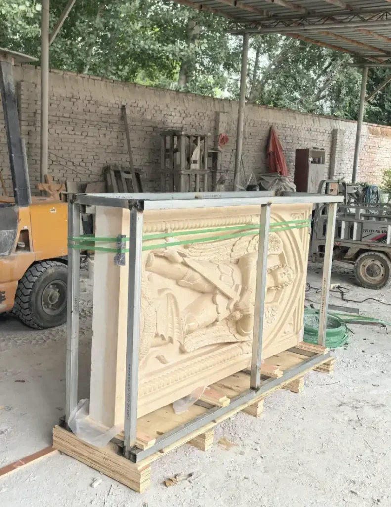 Large marble relief secured inside a reinforced steel frame for international shipping