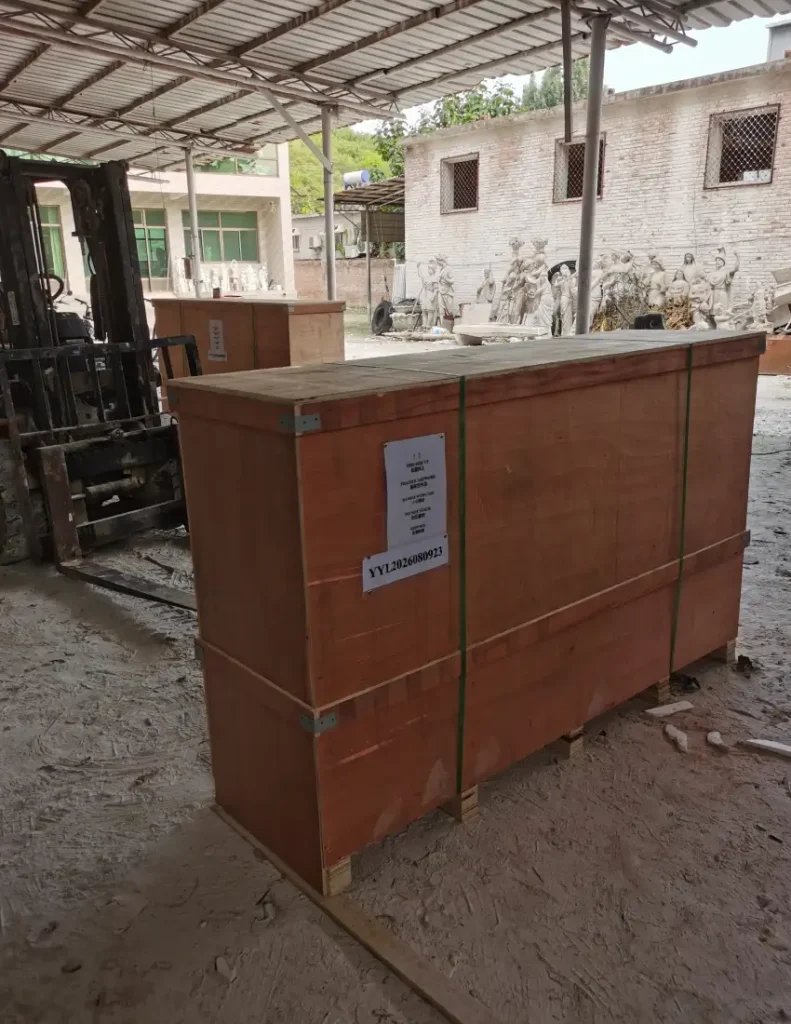 Sealed wooden shipping crate prepared for a large marble relief sculpture