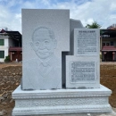 Marble portrait relief sculpture created for a memorial monument