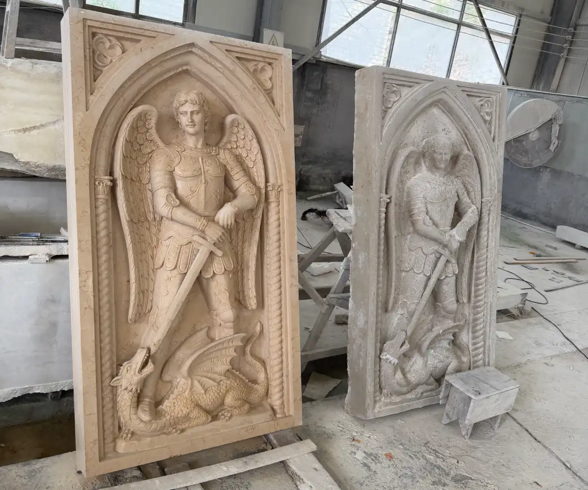 St. Michael marble relief shown beside the sculptural reference during the carving process