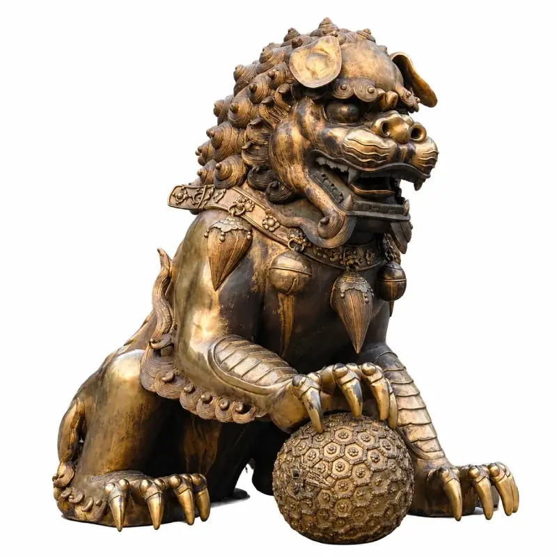 Antique bronze male Foo Dog statue resting one paw on a traditional ball
