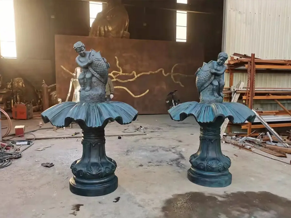 Pair of ballerina fountain sculptures in the workshop before installation