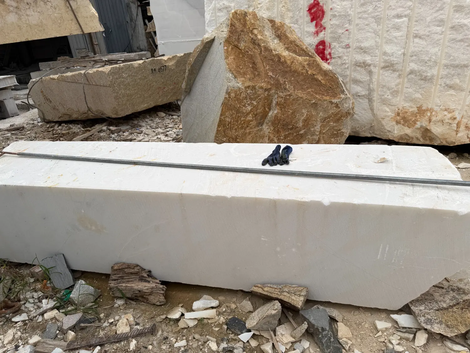 Raw natural stone blocks selected for carving architectural gazebo components