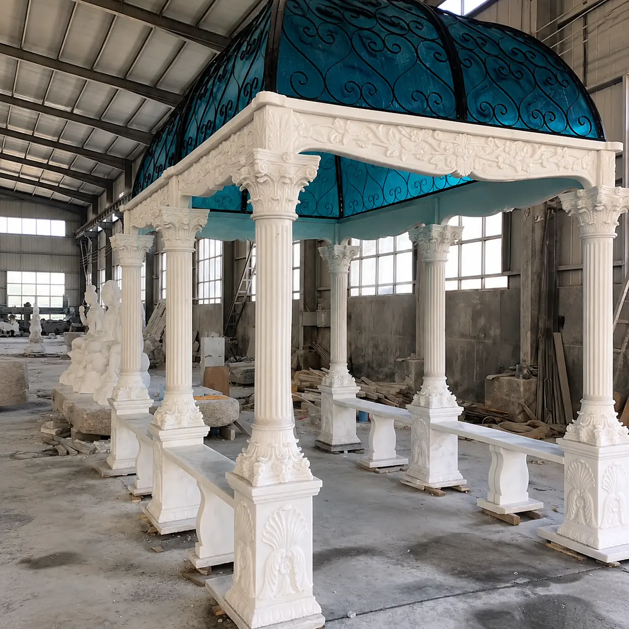 Rectangular white marble gazebo with columns and a blue covered arched canopy in the workshop