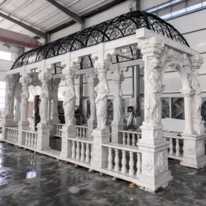 Pale stone columns beneath a blue curved canopy during workshop assembly